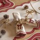 gallery,bow,napkin,rin,88,gold